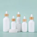 Luxury White Porcelain Cosmetic Container 30ml 50ml 100ml Bamboo Top Essential Oil Serum Glass Dropper Bottle