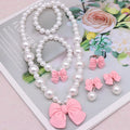 YL Children's Cute Bow Pearl Necklace and Earrings Set with Acrylic & Resin Materials Girls' First Jewelry Student Gift