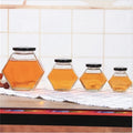 Wholesale Empty 180Ml 280Ml Hexagon Shaped Honey Glass Jar With Screw Lid