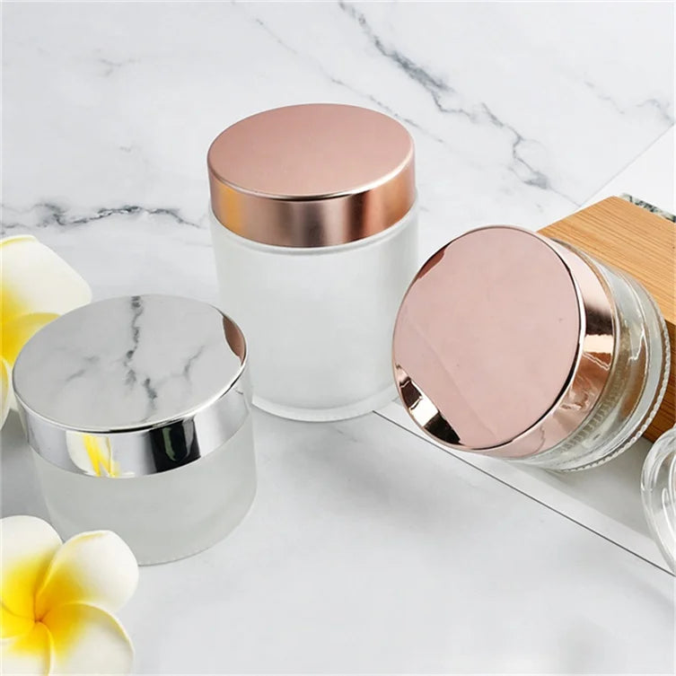 Hot Sale Amber Black clear Frosted 1oz 2oz 50g 60g 100g Glass Cream Jar Bottle with Rotating Rose Gold Lid for Skin Care Cream
