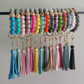 Wholesale Multicolor Gift Holder Elastic Silicone Fashion Bead Bracelets Bangle Wristlet Keychains Tassel for Women