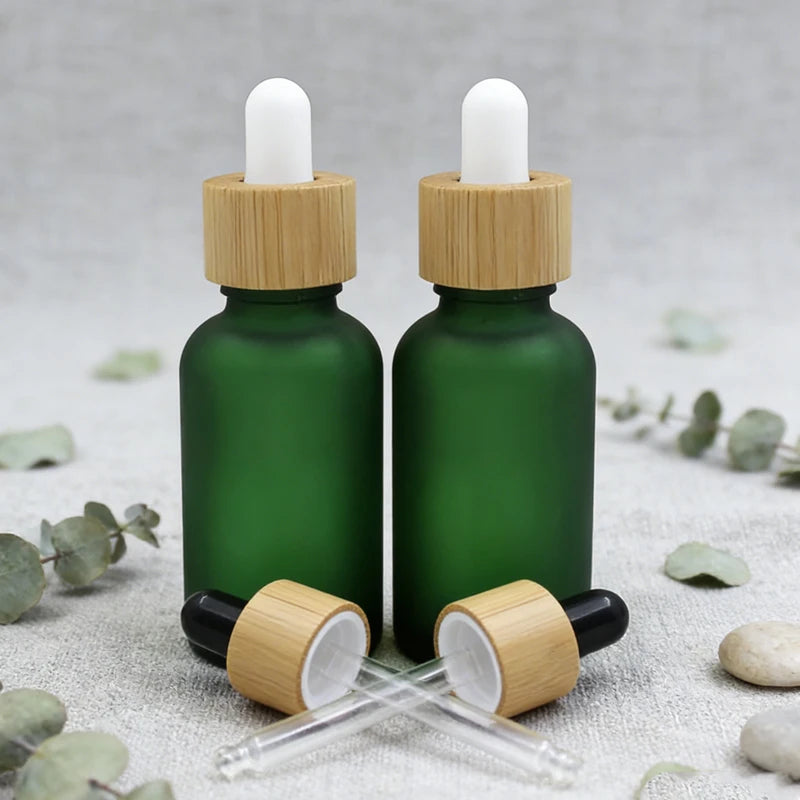 Precision Dispensing Bamboo Lid Green Glass Dropper Bottle for Essential Oil Perfume & Serum Logo Customizable