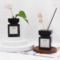 Wholesale Empty square Reed Diffuser Bottle 100ml Black Luxury Reed Diffuser Glass Bottle with Wooden Cap