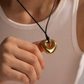 YF3968 Waterproof Stainless Steel 18k Gold Plated Jewelry Black Wax Rope Hollow Heart Pendant Necklace Non Tarnish MegaBDM