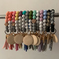 2024 New Design Monogram Leather Tassel Bracelet Keychains Silicone Bead Wristlet Wood Blank Disc for Keychain
