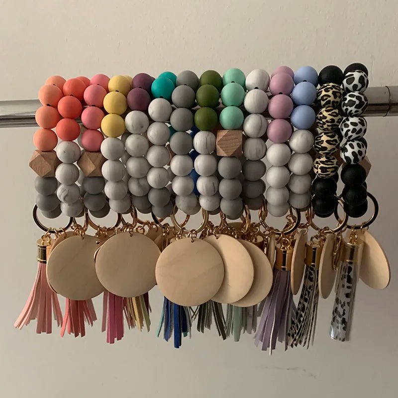 2024 New Design Monogram Leather Tassel Bracelet Keychains Silicone Bead Wristlet Wood Blank Disc for Keychain