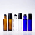 10ml Matte/frosted clear Blue Amber Glass Roll on Bottles With Leak Proof Black Cover Roller Ball Perfume Bottles