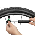 Portable Mini Hand-Operated Air Pump with Mouth Conversion Adapter for Mountain Bicycles and Bicycles in General
