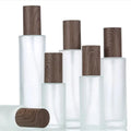 100ml 120ml Frosted Glass Serum Bottle Round Cosmetic Packaging with Press Pump for Body Lotion Sealed by Pump Sayer