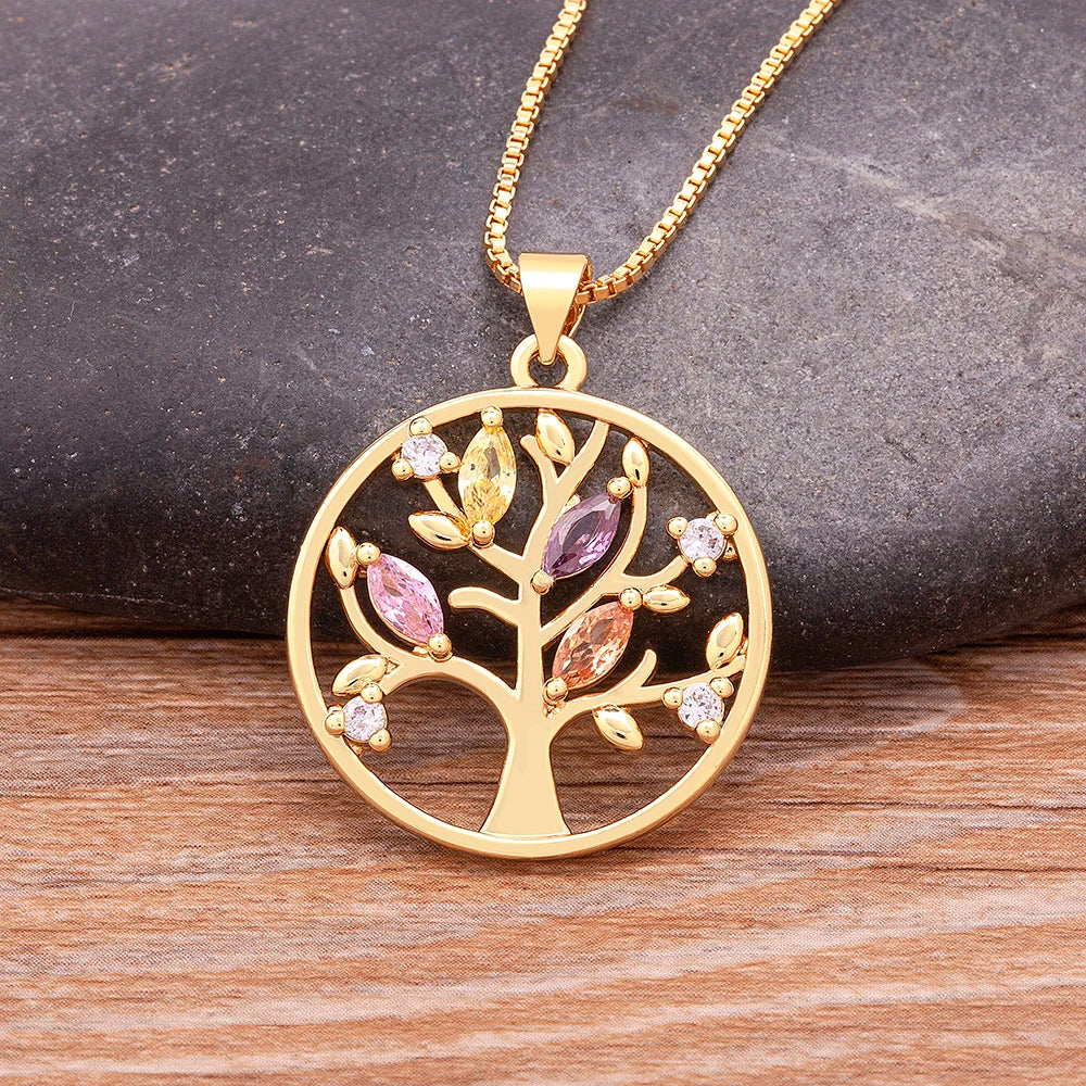 QIKU Wholesale Price Luxury Round Shape Hollow Out Tree Pattern Pendant Necklace Copper Micro Pave Gold Color Jewelry Gift