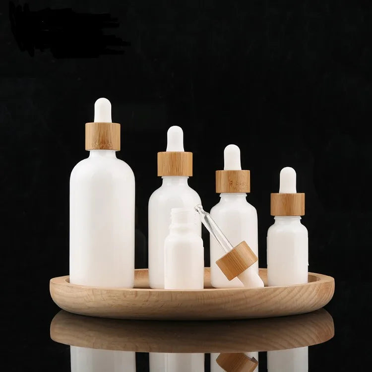 Luxury Empty Essential Oil Bottle Opal White Porcelain Glass Glossy Finish With Natural Bamboo Dropper