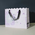 Luxury Kraft Paperboard Bag with Wavy Shape Customized Screen Printed Wig Gift Bag for Clothing Shoes Personalized Your Own Logo
