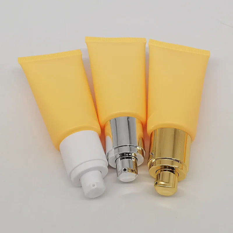 Low MOQ Empty Plastic 50ml Hand Cream Body Lotion Soft Cosmetic Packaging Squeeze Tube Gold Silver White Pump Head