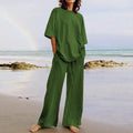New Fashion Two Piece Women Summer Casual Lace up Set Cotton and Linen Half Sleeve O-Neck Top Wide Leg Pants Set