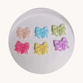 Bulk 100Pcs/Lot 30*30MM Mixed Colors Bowknot Cabochons Kawaii Bow Tie Embellishments for Scrapbooking Phone Case Decoration DIY