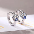 Huitan 2023 Hot Sale Simple Blue Crystal CZ Zirconia Paw Earrings for Girls Cute Silver Plated Cat Claw Shape Hoop Earrings