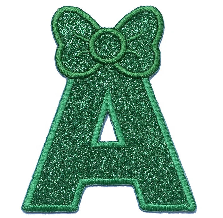 Embroidery Capital a to Z Sparkle Glitter Letter With Bow in Christmas Green Color With Iron on Backing for Girls's Skirt