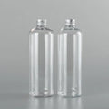 Stock 500ml Round Shoulder Long Pet Plastic Shampoo Bottle with Gold and Silver Aluminum Lid