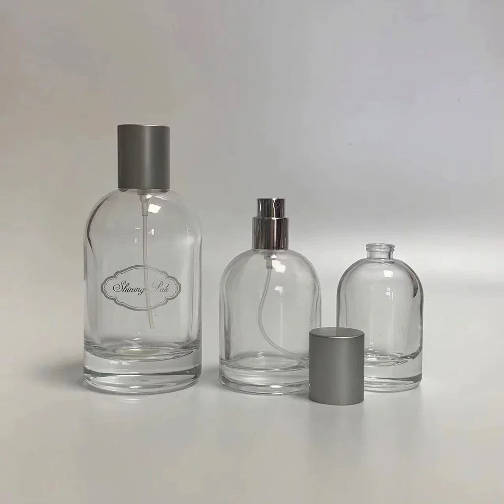 Silver Cap 30ml 50ml 100ml Clear Glass Round Perfume Bottle with Pump Sprayer Seal