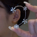 Fancy Wholesale No Piercing Silver Spinning Rotatable Ear Cuff Flower Earrings Ear Wrap Crawlers for Women Rhinestone Ear Cuff