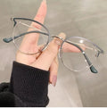 2024 New Design Unique Half Frame Cat Eye Anti Blue Light Glasses Trendy Eyeglasses Frame Blue Light Blocking Glasses