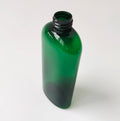 60ml 120ml 250ml Green PET Cosmo Oval Bottles With Smooth White Disc Top Caps for Lotions Soaps Shampoos Dispensing