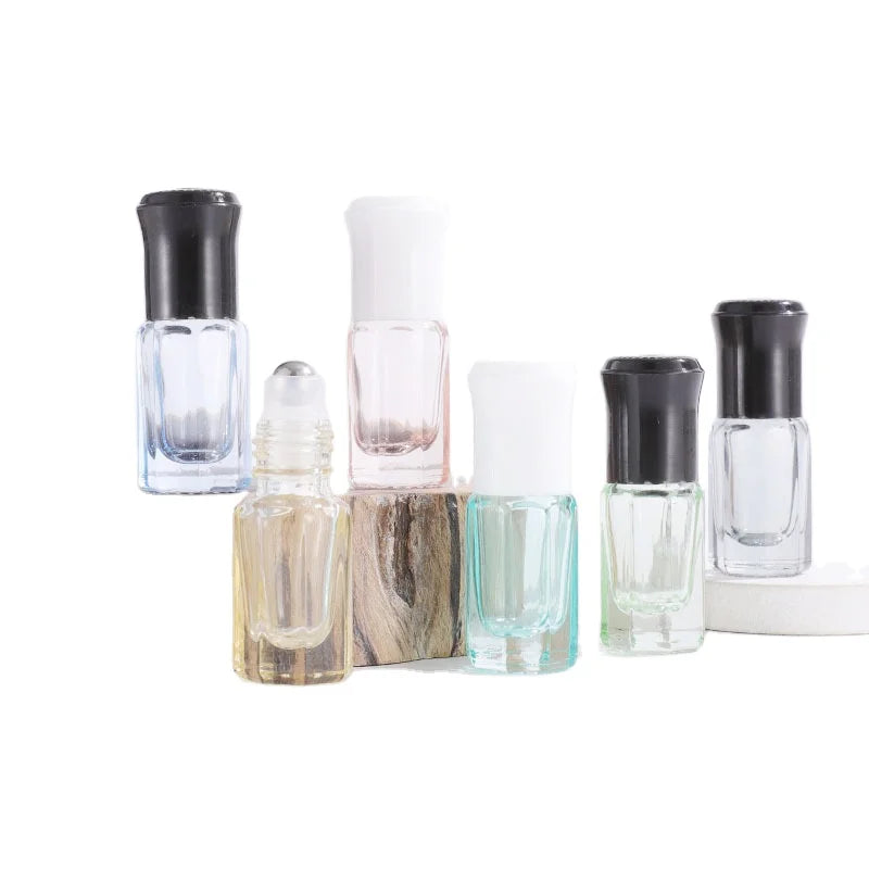 3ml 6ml 12ml Wholesale Logo Printing Octagonal Arabic Fancy Attar Oil Tola Glass Bottle for Oud Oil with Glass Stick Roll on