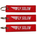 Wholesale Customized logo Luggage Tag Label Before Embroidery Keyring Flight for logo Woven Keychains Embroidery Key Tags