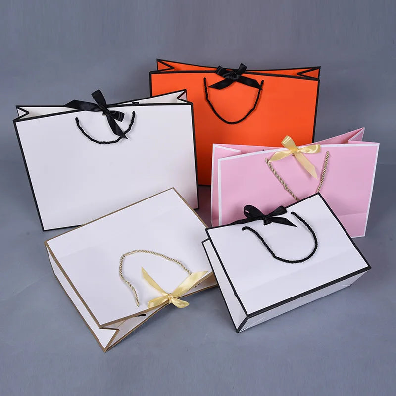 Boutique Reusable Luxury Jewelry Cosmetics Clothing Gift Packaging Shopping Paper Bags With Ribbon Handles and Bow Tie