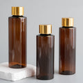 Hot Sale 100ml-300ml Amber PET Plastic Luxury Shampoo Bottles with Electroplate Cap Screen Printing for Skin Care Serum & Lotion