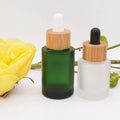 Flat Shoulder 30ml 1oz Cosmetic Green Bottle Glass Dropper 15 ml with Bamboo Dropper Lid