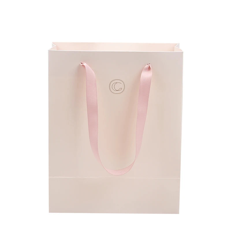 Cheap Custom Printed Luxury Retail Pink Paper Shopping Bag Color Low Cost Paper Bag Supplier Pink Paper Bag With Your Own Logo