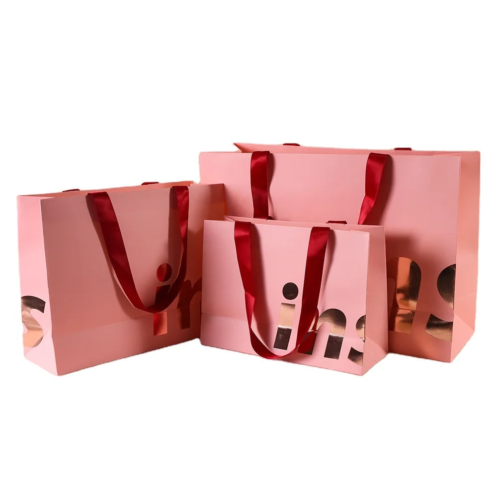 Customize Logo Cloth Boutique Cardboard Packaging  Matte Cheap Pink Gift Paper Bag with Your Own Logo for Small Business