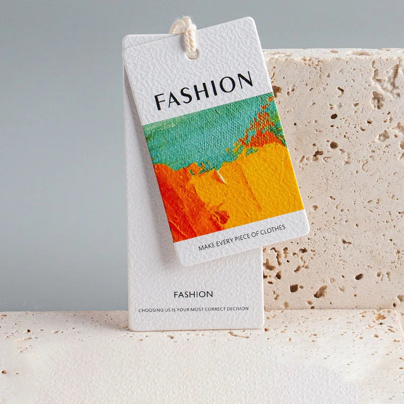 Wholesale Thick High Quality Eco Friendly Paper Clothing Labels Swing Tags Custom Logo Shape Color Hang Tags