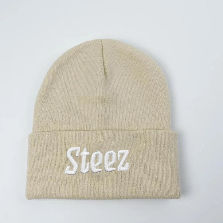 2025 New Style Beige Acrylic Jacquard Texture Ripped Skull Beanie Custom 3D Embroidery Logo Letter Pattern Unisex Common Fabric