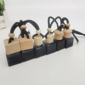 Hot Selling 5ml 8ml Car Perfume Bottle Pendant Glass Black Aromatherapy Bottle with Wooden Cover Essential Oil Air Freshener