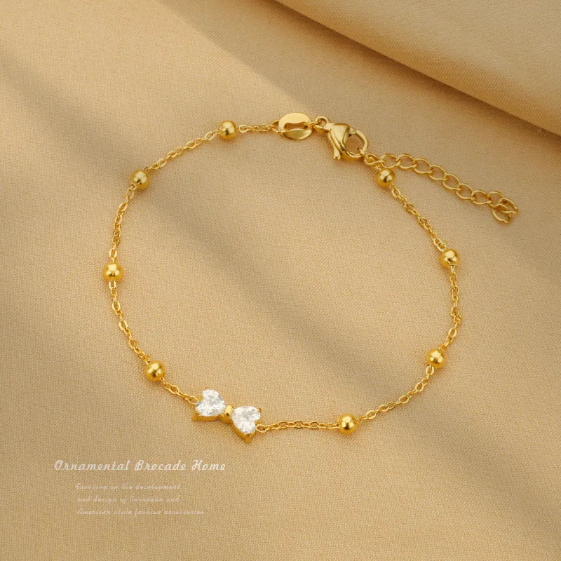 New Arrival Elegant Jewelry Minimalist Stainless Steel Gold Plated Bow Knot Zircon Women Bracelet