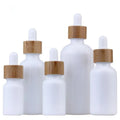 In Stock 10ml 15ml 30ml 50ml 100ml White Porcelain Glass Dropper Bottle With Bamboo Dropper for Serum Cosmetics