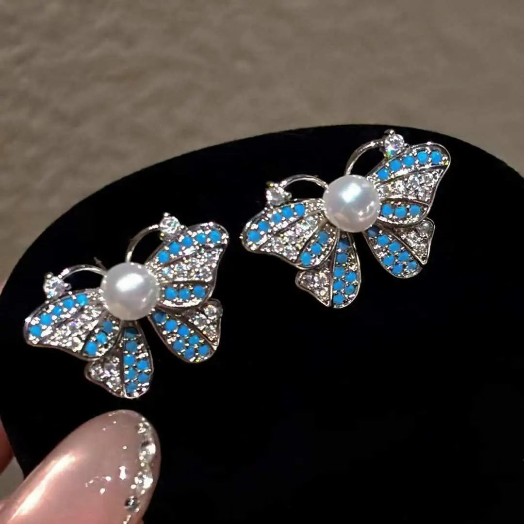 2026 New White Butterfly Pearl Stud Earrings Zhuji 5-6mm AAAA Luxury Natural Freshwater Bread Pearls Women's Personalized Brass