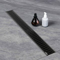 Modern 28 Inch Matte Black Shower Trench Drain 304 Stainless Steel Linear Floor Waste with Removable Cover for Wet Room