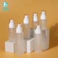 YAN Packaging 20ml 30ml Clear Frosted Round Flat Shoulder Lotion Serum Cream Cosmetic Glass Bottle with Plastic Sprayer Pump Cap