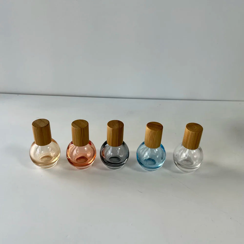 Wholesale 10ml Metal Roll-on Essential Oil Glass Bottles Bulb Shape with Bamboo Lid in Pink Grey Clear Blue Orange Colors