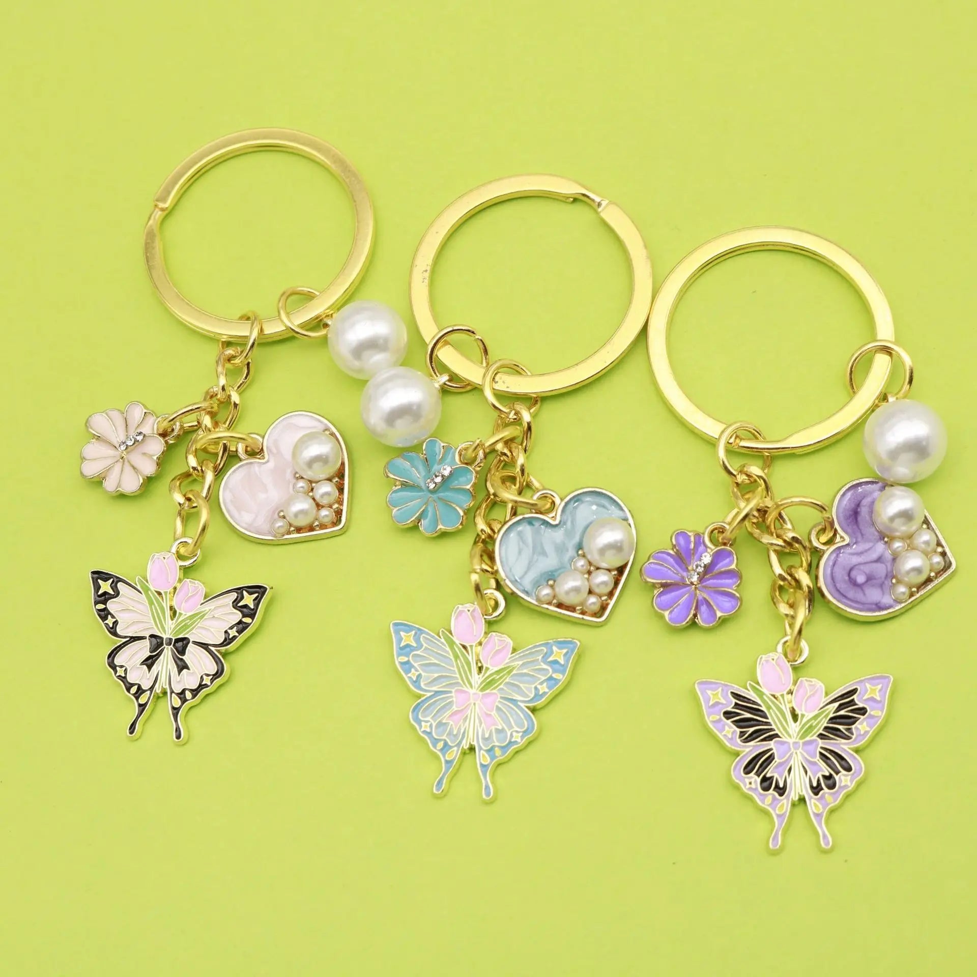 Cross-Border New Product Purple Heart Pearl Imitation Tulip Flower Butterfly Keychain Pendant Drip Oil Inspired Made Metal