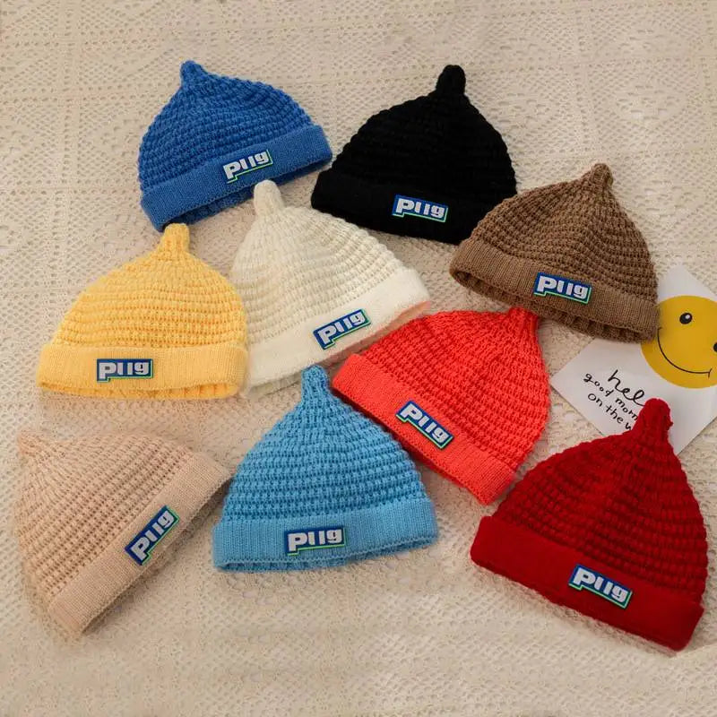 OEM Girls Boys Winter Thick PVC Patch Jacquard Chunky Knitted Hat Kids Acrylic Custom Skully Satin Lined Cuffless Fur Travel