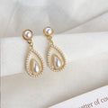 Retro Pearl Earrings Palace Style Hollow Water Drop Earrings Light Luxury Temperament Simple Earrings