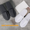 Hot Spot Wholesale Hotel Disposable Slippers New Home Hospitality Integrated Molding Non-woven Pearl Cotton Sponge Sole QINMU