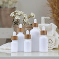 Wholesale Luxury Opal White Porcelain Glass Serum Bottles 5ml 50ml 100ml Perfumes Essential Oil Dropper Bottle for Diffusers
