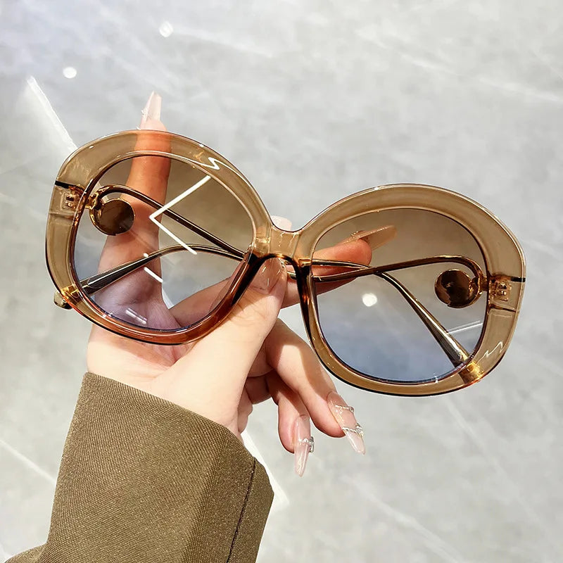 High Quality Retro Versatile Oval Sunglasses Women Black Metal Frame Custom Logo Lens Polar Sun Protection Outdoor Street Photos
