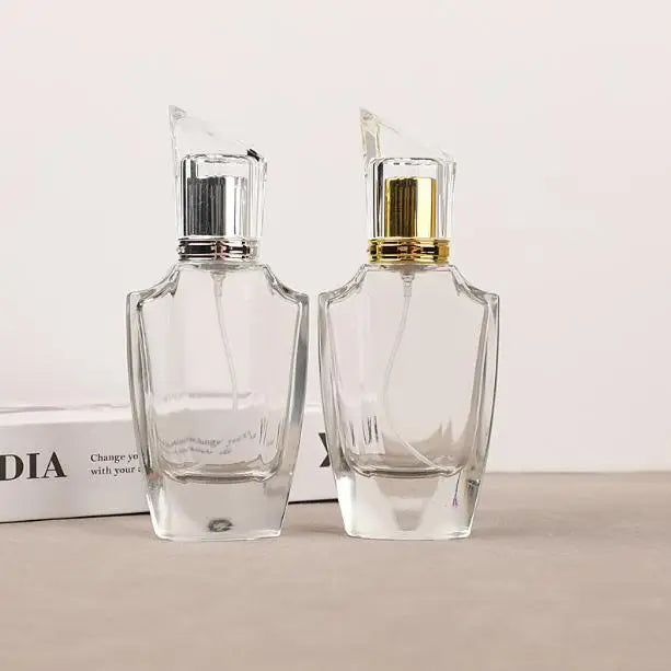 Top Selling Transparent Color Thick Bottom Gold Silver Diamond Cap Man Woman Luxury Glass Perfumes Bottle 50 ml