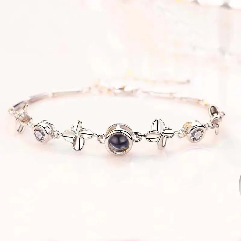 Lateefah OEM Four Leaf One Hundred Languages Jewelry Love Heart Charm Bracelet